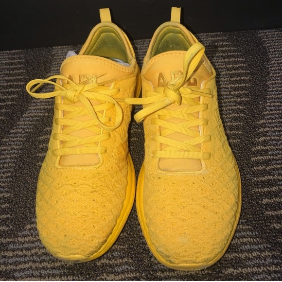 yellow apl sneakers